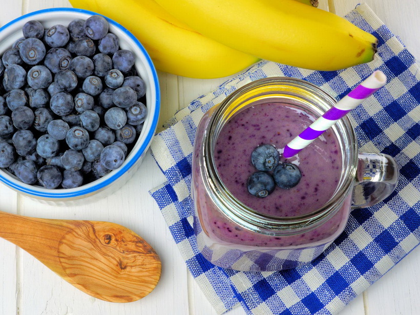 Blueberry, banana smoothie table scene