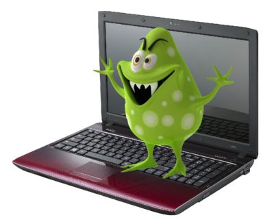Вірусний монстр стоїть на ноутбуці